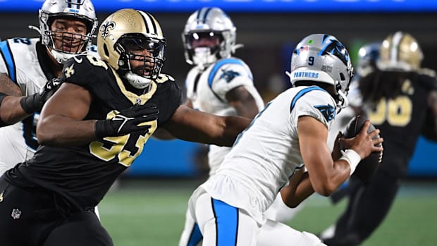 Carolina Panthers quarterback Bryce Young (9) is sacked by New Orleans Saints defensive tackle Nathan Shepherd (93) 