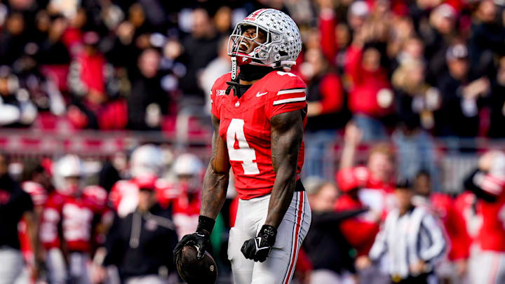 Ohio State Buckeyes wide receiver Jeremiah Smith (4) celebrates after catching a pass in the second half of the college football game at Ohio Stadium on Saturday, Nov. 1, 2025, in Columbus, Ohio.