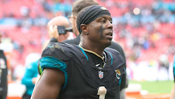 Oct 1, 2023; London, United Kingdom;  Jacksonville Jaguars running back Travis Etienne Jr. (1) leaves the field after the second half of an NFL International Series game at Wembley Stadium. Mandatory Credit: Peter van den Berg-Imagn Images