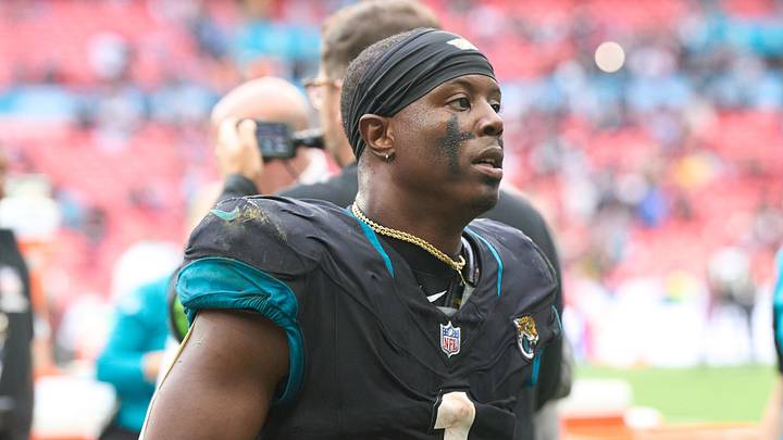 Oct 1, 2023; London, United Kingdom;  Jacksonville Jaguars running back Travis Etienne Jr. (1) leaves the field after the second half of an NFL International Series game at Wembley Stadium. Mandatory Credit: Peter van den Berg-Imagn Images