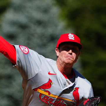 Sep 26, 2024; Denver, Colorado, USA; St. Louis Cardinals starting pitcher Kyle Gibson (44) delivers a pitch in the first inning against the Colorado Rockies at Coors Field. Mandatory Credit: Ron Chenoy-Imagn Images