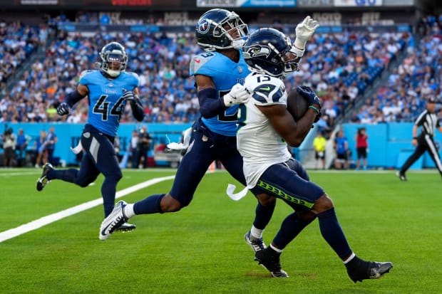 Seattle Seahawks wide receiver Easop Winston Jr. (13) pulls in a touchdown.