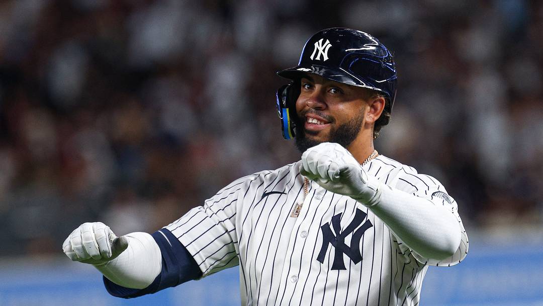 Aug 26, 2026; Bronx, New York, USA; New York Yankees first baseman Luis Garcia Jr. (26) reacts after an infield single during the seventh inning against the Houston Astros at Yankee Stadium. Mandatory Credit: Vincent Carchietta-Imagn Images