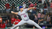 Aug 22, 2025; Cumberland, Georgia, USA; New York Mets pitcher Ryan Helsley (56) pitches the ball against the Atlanta Braves during the ninth inning at Truist Park. Mandatory Credit: Jordan Godfree-Imagn Images