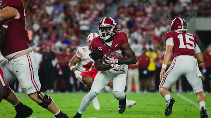 Aug 31, 2024; Tuscaloosa, Alabama, USA;  Alabama Crimson Tide running back Kevin Riley (28) carries the ball against the Western Kentucky Hilltoppers during the fourth quarter at Bryant-Denny Stadium. 