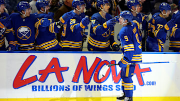 Nov 9, 2024; Buffalo, New York, USA;  Buffalo Sabres left wing Zach Benson (9) celebrates his goal with teammates during the first period against the Calgary Flames at KeyBank Center. Mandatory Credit: Timothy T. Ludwig-Imagn Images