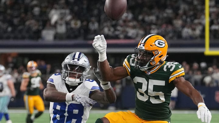 Green Bay Packers cornerback Corey Ballentine prevents a completion to the Cowboys' CeeDee Lamb during the playoffs.