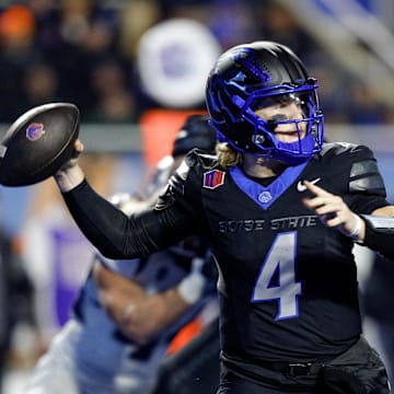 Nov 9, 2024; Boise, Idaho, USA; Boise State Broncos quarterback Maddux Madsen (4) throws against the Nevada Wolf Pack at Albertsons Stadium. Boise State won 28-21.  Mandatory Credit: Brian Losness-Imagn Images

