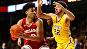 Indiana Hoosiers forward Justin Smith (3) in action while Minnesota Golden Gophers guard Gabe Kalscheur (22) defends in the second half at Williams Arena.