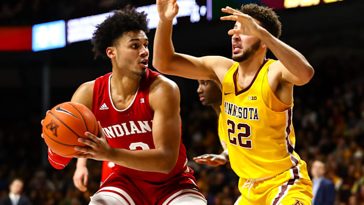 Indiana Hoosiers forward Justin Smith (3) in action while Minnesota Golden Gophers guard Gabe Kalscheur (22) defends in the second half at Williams Arena. Indiana Hoosiers forward Justin Smith (3) in action while Minnesota Golden Gophers guard Gabe Kalscheur (22) defends in the second half at Williams Arena.
