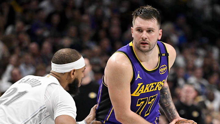 Apr 9, 2025; Dallas, Texas, USA; Dallas Mavericks center Daniel Gafford (21) and Los Angeles Lakers guard Luka Doncic (77) in action during the game between the Dallas Mavericks and the Los Angeles Lakers at American Airlines Center. Mandatory Credit: Jerome Miron-Imagn Images