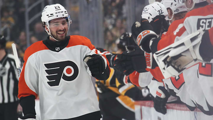 Philadelphia Flyers left wing Noah Cates celebrates with teammates after scoring a goal against the Pittsburgh Penguins.
