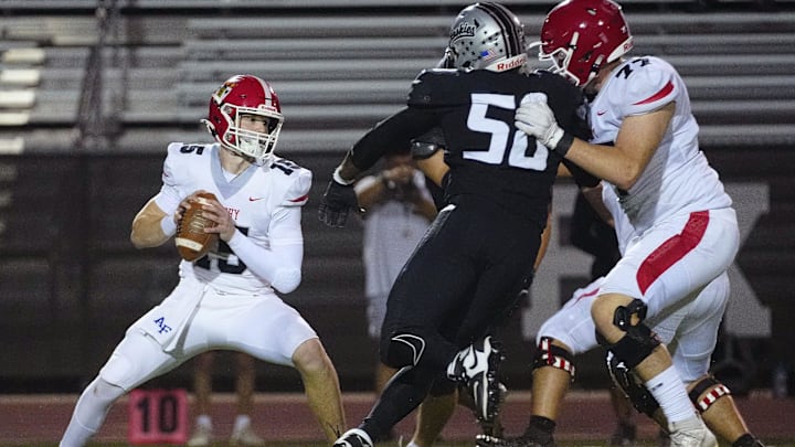 Brophy quarterback looks for a receiver against Hamilton during a game at Hamilton High School in Chandler, on Sept. 19, 2025.