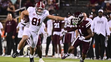 Alabama Crimson Tide tight end CJ Dippre (81) runs the ball while defended by Mississippi State Bulldogs safety Marcus Banks (1) during the second half at Davis Wade Stadium at Scott Field. Matt Bush-USA TODAY Sports