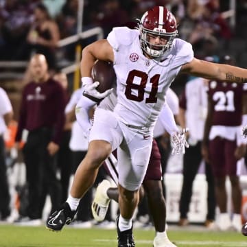 Alabama Crimson Tide tight end CJ Dippre (81) runs the ball while defended by Mississippi State Bulldogs safety Marcus Banks (1) during the second half at Davis Wade Stadium at Scott Field. Matt Bush-USA TODAY Sports