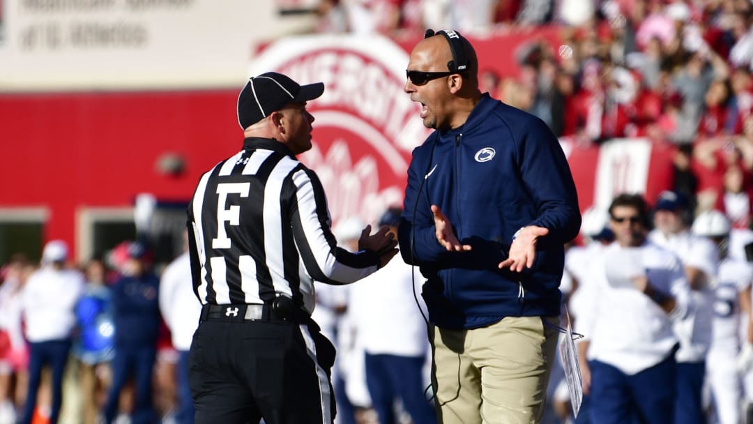 Penn State Nittany Lions head coach James Franklin argues with a referee 