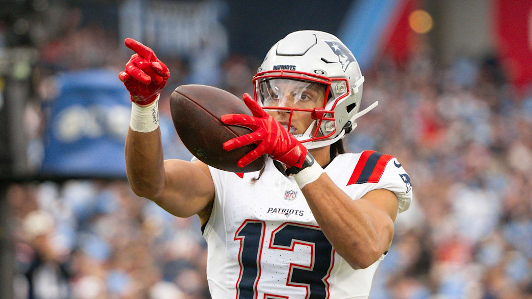 Oct 19, 2025; Nashville, Tennessee, USA;  New England Patriots wide receiver Mack Hollins (13) points after making the first down against the Tennessee Titans during the first half at Nissan Stadium. Mandatory Credit: Steve Roberts-Imagn Images