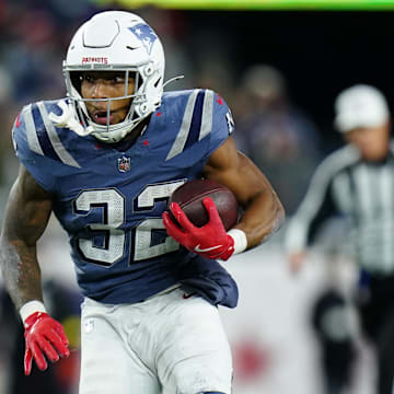 Nov 13, 2025; Foxborough, Massachusetts, USA; New England Patriots running back TreVeyon Henderson (32) runs the ball during the second half against New York Jets at Gillette Stadium. Mandatory Credit: David Butler II-Imagn Images