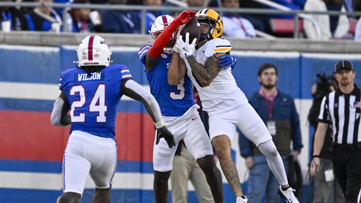 Nov 30, 2024; Dallas, Texas, USA; Southern Methodist Mustangs safety Ahmaad Moses (3) and California Golden Bears wide receiver Mikey Matthews (8) in action during the game between the SMU Mustangs and the California Golden Bears at Gerald J. Ford Stadium. Mandatory Credit: Jerome Miron-Imagn Images Nov 30, 2024; Dallas, Texas, USA; Southern Methodist Mustangs safety Ahmaad Moses (3) and California Golden Bears wide receiver Mikey Matthews (8) in action during the game between the SMU Mustangs and the California Golden Bears at Gerald J. Ford Stadium. Mandatory Credit: Jerome Miron-Imagn Images