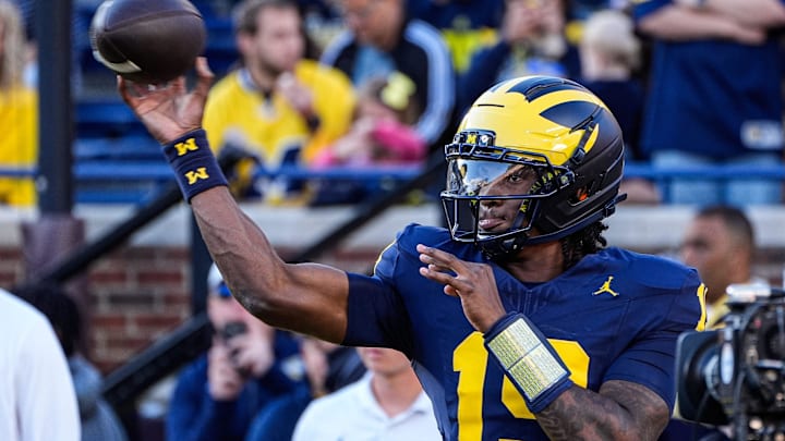 Michigan quarterback Bryce Underwood (19) warms up ahead of the New Mexico game at Michigan Stadium in Ann Arbor on Saturday, August 30, 2025.