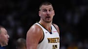 Apr 11, 2025; Denver, Colorado, USA; Denver Nuggets center Nikola Jokic (15) reacts in the fourth quarter against the Memphis Grizzlies at Ball Arena. Mandatory Credit: Ron Chenoy-Imagn Images
