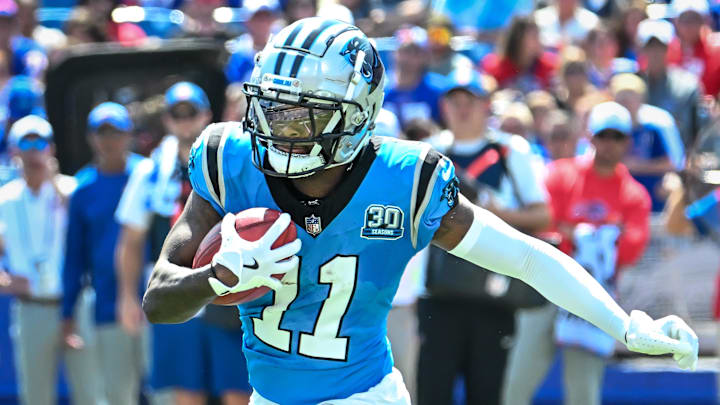 Aug 24, 2024; Orchard Park, New York, USA; Carolina Panthers wide receiver Ihmir Smith-Marsette (11) returns a kickoff against the Buffalo Bills in the second quarter pre-season game at Highmark Stadium.  