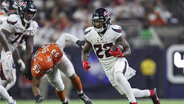 Sep 15, 2024; Houston, Texas, USA; Houston Texans safety Eric Murray (23) runs with the ball during the fourth quarter against the Chicago Bears at NRG Stadium.