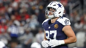 Nov 27, 2025; Arlington, Texas, USA; Dallas Cowboys tight end Jake Ferguson (87) warms up prior to the game against the Kansas City Chiefs at AT&T Stadium. 