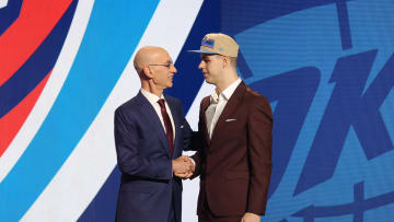 Jun 26, 2024; Brooklyn, NY, USA; Nikola Topic shakes hands with NBA commissioner Adam Silver after being selected in the first round by the Oklahoma City Thunder in the 2024 NBA Draft at Barclays Center. Mandatory Credit: Brad Penner-USA TODAY Sports