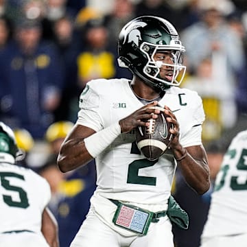 Michigan State quarterback Aidan Chiles looks before making a pass against Michigan during the first half at Michigan Stadium in Ann Arbor on Saturday, Oct. 26, 2024.