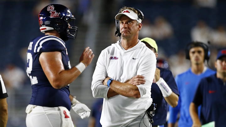 Aug 31, 2024; Oxford, Mississippi, USA; Mississippi Rebels head coach Lane Kiffin looks at the jumbotron during the second half against the Furman Paladins at Vaught-Hemingway Stadium. Mandatory Credit: Petre Thomas-Imagn Images