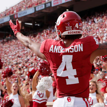 Oklahoma's Nic Anderson (4) celebrates a touchdown in the first half of the college football game between the University of Oklahoma Sooners and the University of Central Florida Knights at Gaylord Family Oklahoma-Memorial Stadium in Norman, Okla., Saturday, Oct., 21, 2023.