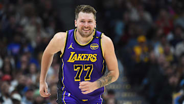 Feb 22, 2025; Denver, Colorado, USA; Los Angeles Lakers guard Luka Doncic (77) after a basket during the first half against the Denver Nuggets at Ball Arena. Mandatory Credit: Christopher Hanewinckel-Imagn Images