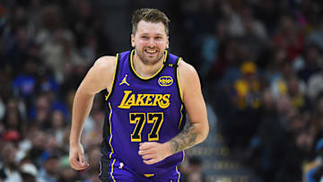 Feb 22, 2025; Denver, Colorado, USA; Los Angeles Lakers guard Luka Doncic (77) after a basket during the first half against the Denver Nuggets at Ball Arena. Mandatory Credit: Christopher Hanewinckel-Imagn Images
