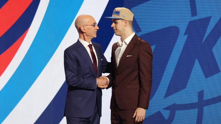 Jun 26, 2024; Brooklyn, NY, USA; Nikola Topic shakes hands with NBA commissioner Adam Silver after being selected in the first round by the Oklahoma City Thunder in the 2024 NBA Draft at Barclays Center. Mandatory Credit: Brad Penner-USA TODAY Sports