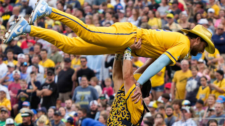 The Savannah Bananas played the Texas Tailgaters at Great American Ballpark on Friday June 13, 2025. The game included music, dancing, non-baseball games, backflips and featured Reds players like Todd Frazier, Bronson Arroyo and Sean Casey. The Bananas will play the Texas Tailgaters again on Saturday to a packed Great American Ballpark. The Savannah Bananas played the Texas Tailgaters at Great American Ballpark on Friday June 13, 2025. The game included music, dancing, non-baseball games, backflips and featured Reds players like Todd Frazier, Bronson Arroyo and Sean Casey. The Bananas will play the Texas Tailgaters again on Saturday to a packed Great American Ballpark.