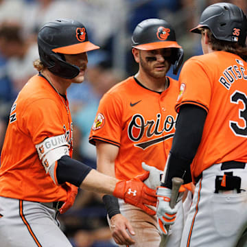 Jun 8, 2024; St. Petersburg, Florida, USA;  Baltimore Orioles shortstop Gunnar Henderson (2) celebrates with catcher Adley Rutschman (35) after hitting a three-run home run against the Tampa Bay Rays in the ninth inning  at Tropicana Field.