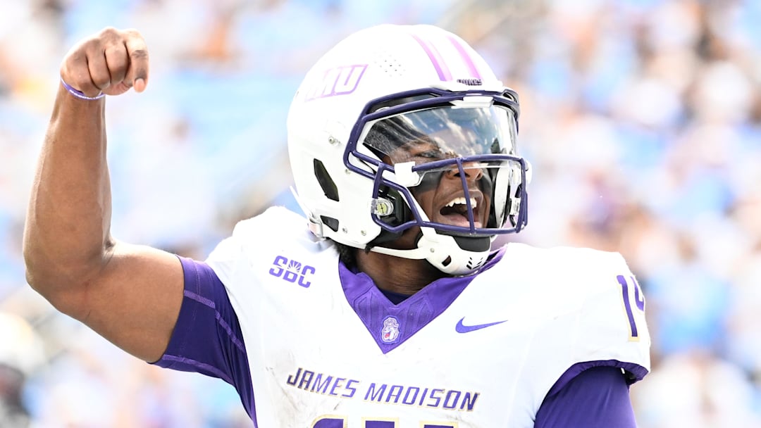 Sep 21, 2024; Chapel Hill, North Carolina, USA; James Madison Dukes quarterback Alonza Barnett III (14) reacts in the second quarter at Kenan Memorial Stadium. Mandatory Credit: Bob Donnan-Imagn Images Sep 21, 2024; Chapel Hill, North Carolina, USA; James Madison Dukes quarterback Alonza Barnett III (14) reacts in the second quarter at Kenan Memorial Stadium. Mandatory Credit: Bob Donnan-Imagn Images