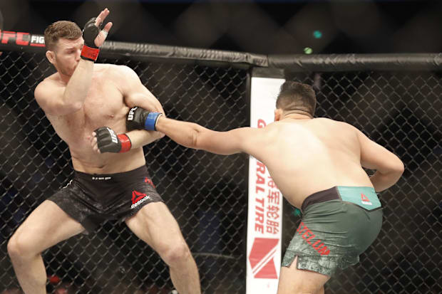 Kelvin Gastelum fights Michael Bisping during a UFC Fight Night at Mercedes-Benz Arena. 