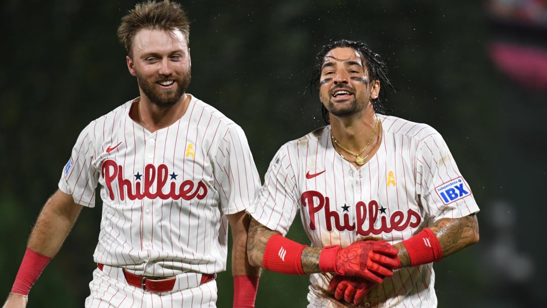 Sep 1, 2024; Philadelphia, Pennsylvania, USA;  Philadelphia Phillies outfielder Nick Castellanos (8) and third baseman Kody Clemens (2) walk off the field after 11th inning win against the Atlanta Braves at Citizens Bank Park.