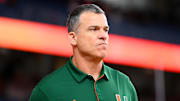 Nov 30, 2024; Syracuse, New York, USA; Miami Hurricanes head coach Mario Cristobal looks on prior to the game against the Syracuse Orange at the JMA Wireless Dome. Mandatory Credit: Rich Barnes-Imagn Images