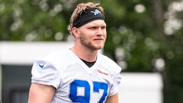 Detroit Lions defensive end Aidan Hutchinson (97) walks off the field after practice during training camp at Meijer Performance Center in Allen Park on Sunday, July 20, 2025.