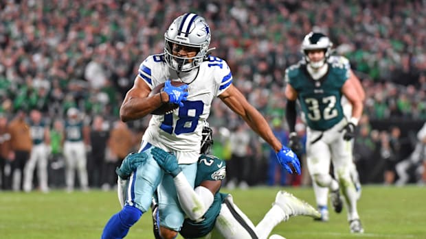 Philadelphia Eagles cornerback James Bradberry (24)  tackles Dallas Cowboys wide receiver Jalen Tolbert (18) during the fourt