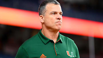 Nov 30, 2024; Syracuse, New York, USA; Miami Hurricanes head coach Mario Cristobal looks on prior to the game against the Syracuse Orange at the JMA Wireless Dome. Mandatory Credit: Rich Barnes-Imagn Images