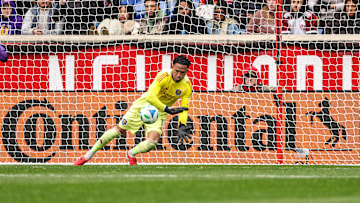 Mar 15, 2025; Harrison, New Jersey, USA; Orlando City goalkeeper Pedro Gallese (1) makes a save during the first half against the New York Red Bulls during the first half at Sports Illustrated Stadium. Mandatory Credit: Vincent Carchietta-Imagn Images