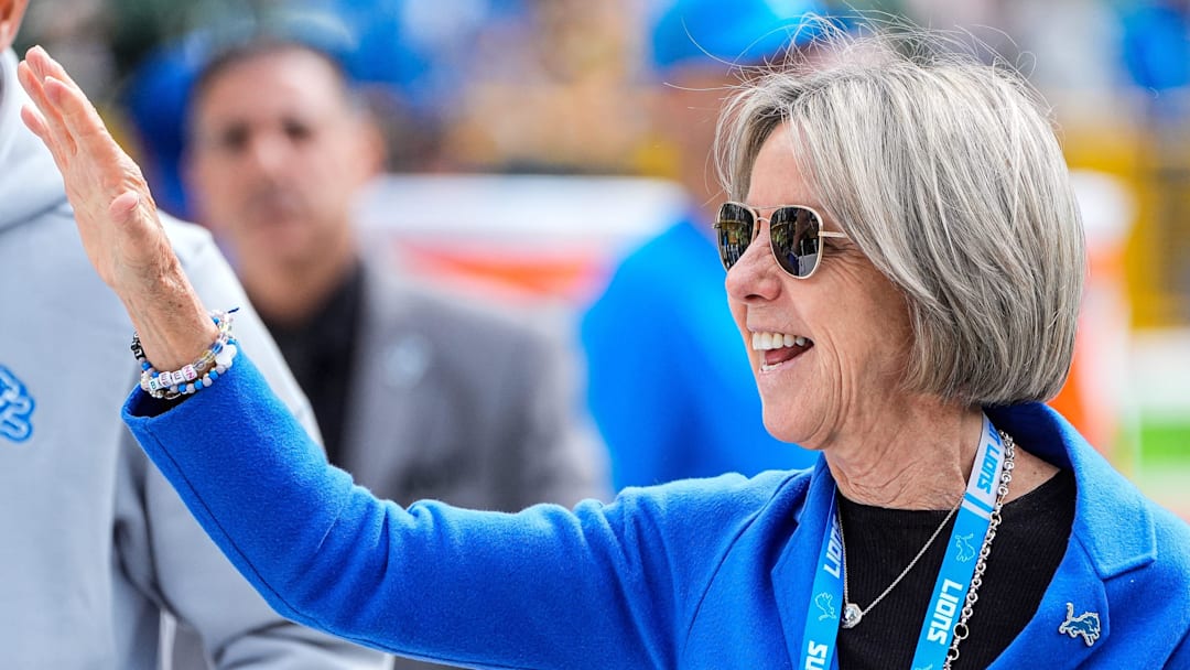 Detroit Lions owner Sheila Hamp waves at fans during warmups ahead of the season-opening game 