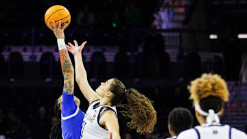 Notre Dame forward Maddy Westbeld (21) and SMU center Jessica Peterson tip-off during a NCAA women's basketball game between Notre Dame and SMU at Purcell Pavilion on Sunday, Jan. 19, 2025, in South Bend.