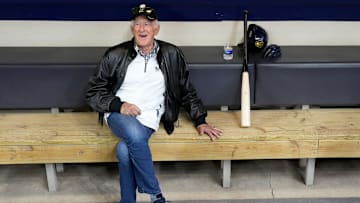 Milwaukee Brewers play-by-play announcer Bob Uecker sits in the dugout during a workout at American Family Field in Milwaukee on Wednesday, April 6, 2022. Uecker passed away early Thursday morning, Jan. 16, 2025 at his home at the age of 90.