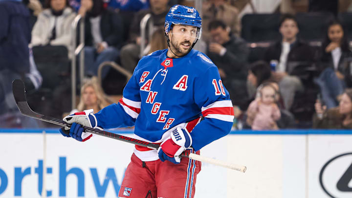 Apr 5, 2026; New York, New York, USA; New York Rangers center Vincent Trocheck (16) skates against the Washington Capitals during the first period at Madison Square Garden.