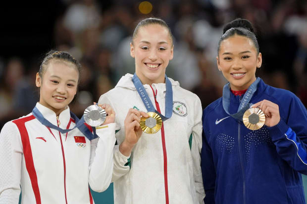 China's Qiyuan Qiu (left) took silver while Algeria's Kaylia Nemour (center) won gold. 